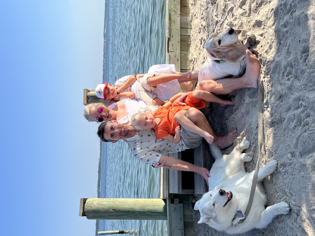 The family behind Scenic City Pumpkins together on a bright day at the beach.